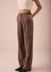 A Model Wearing Brown Handwoven Cotton The Hazel Sun Handspun Handwoven Organic Cotton Trousers, curated by Only Ethikal